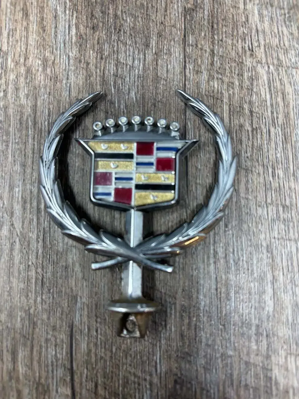 Vintage Iconic GM Cadillac crest and wreath hood ornament emblem with gold birds